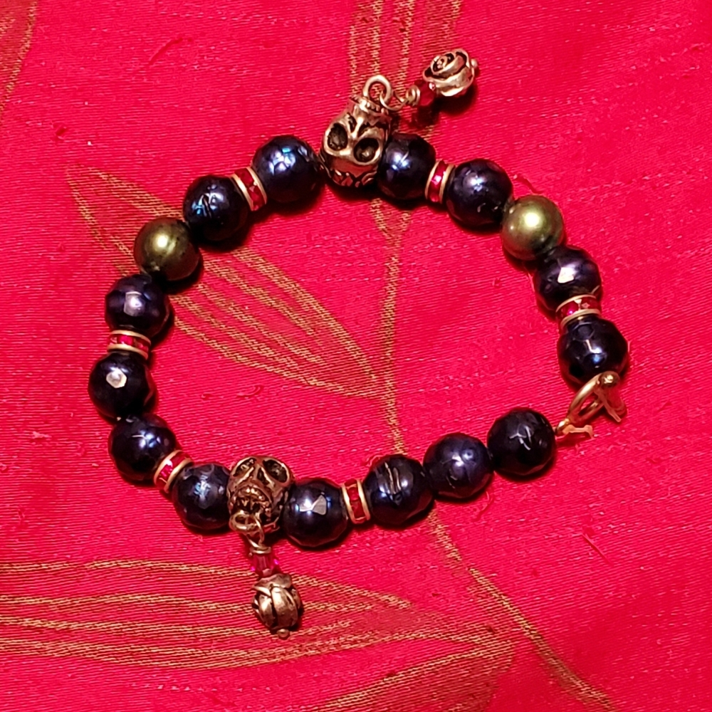 Lot of 4 sugar skull braceletts